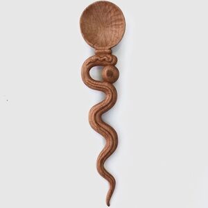 Minimalist serpent and orb hand carved wood spoon